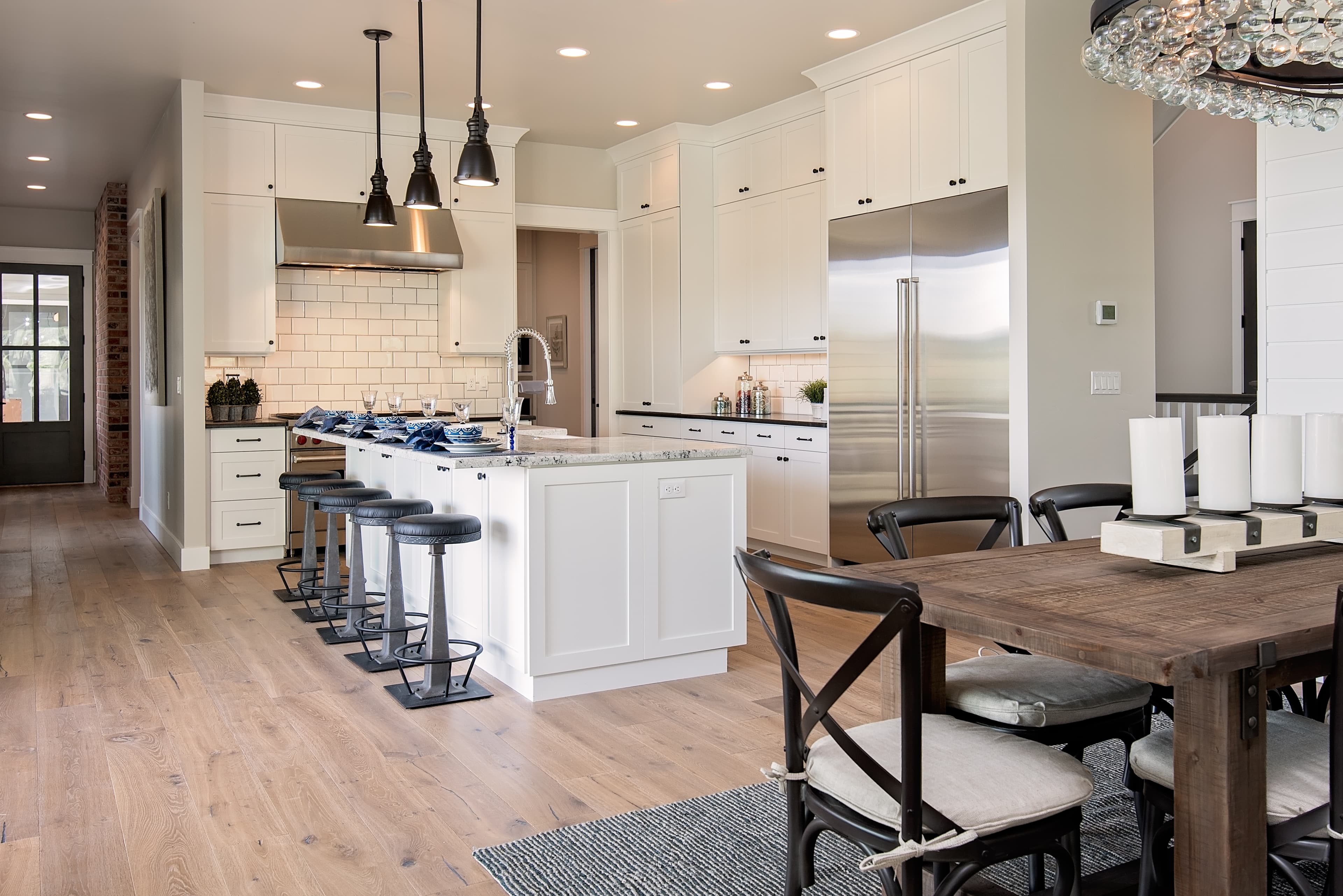 White farmhouse kitchen with granite island