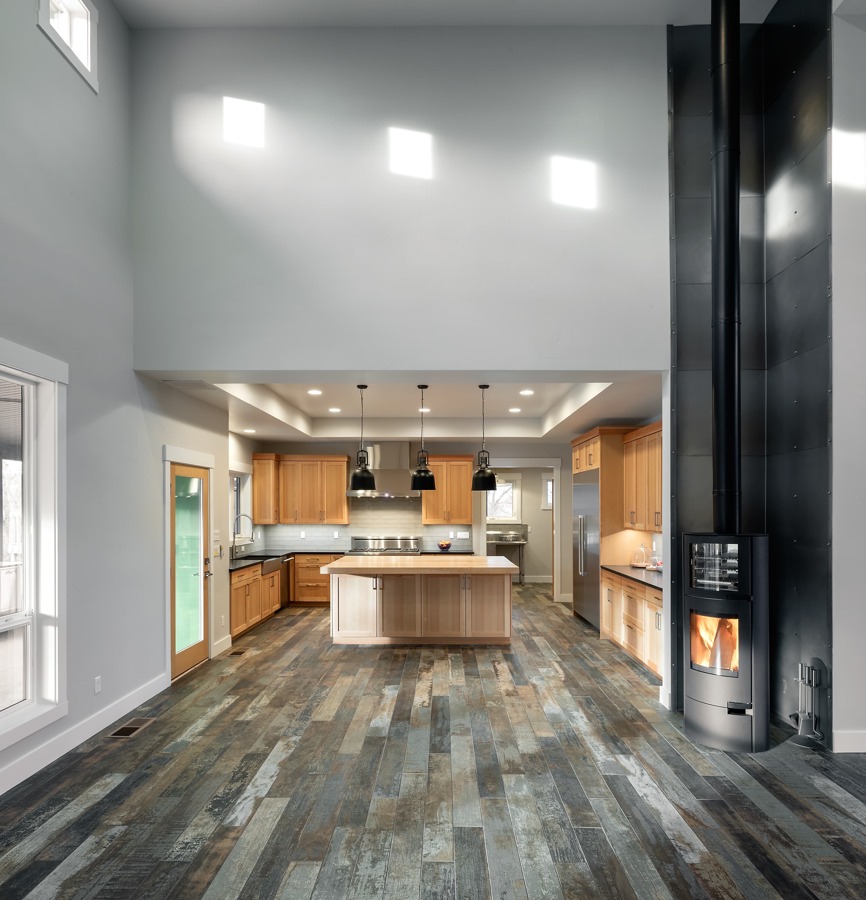 Open concept kitchen with high ceilings