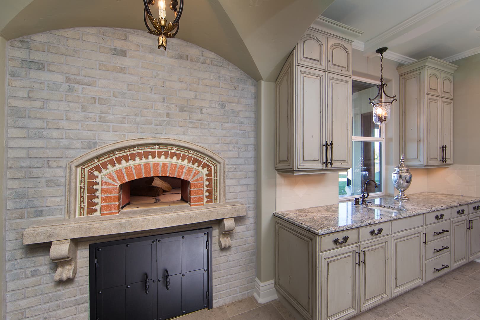 Contemporary kitchen with stone countertop and stainless appliances — Superior Stone Boise